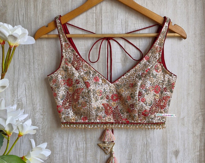 Embossed Sleeveless Blouse with Batik Printed Lehenga Set