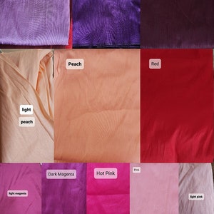 May include: A color chart of fabric swatches in various shades of blue, green, purple, red, pink, orange, yellow, beige, and gray. The swatches are arranged in a grid pattern and labeled with the corresponding color names.