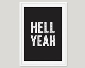 May include: A black and white framed print with the text "HELL YEAH" in a white distressed font.