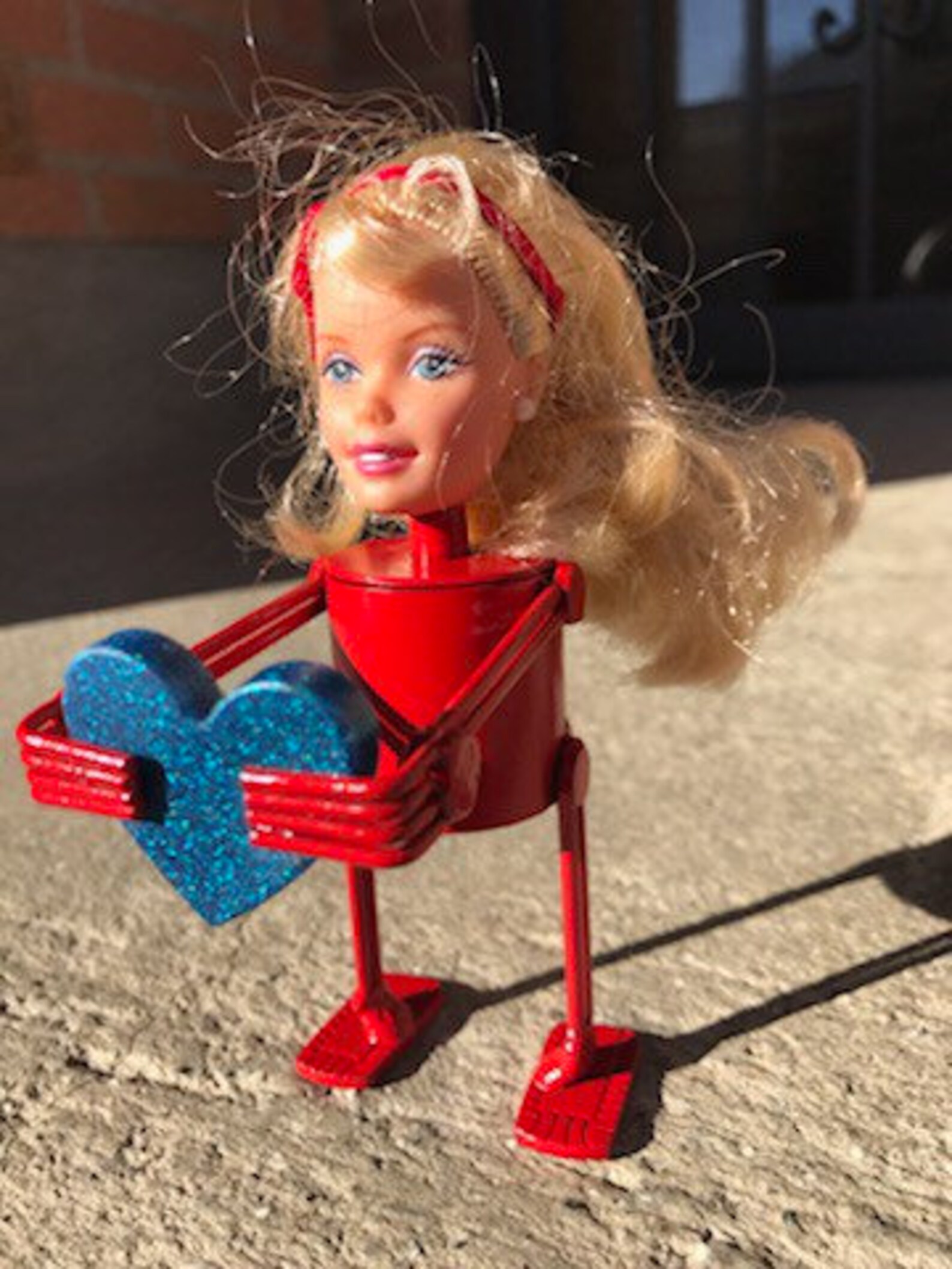 Creepy scrap metal barbie robot with heart | Etsy