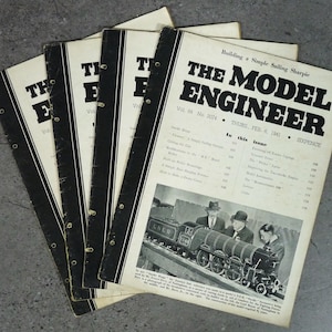 May include: A collection of four vintage copies of The Model Engineer magazine, dated February 6, 1941. Each issue features a black and white cover with bold typography, a list of articles, and a photograph of a model steam locomotive engine.