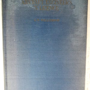 May include: A blue book titled "Aircraft Engineer's Licence" by G.W. Williamson. The cover has gold lettering and a textured finish. The book appears to be an older edition, with signs of wear.