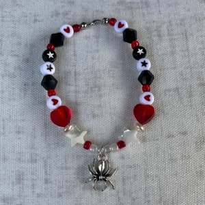 spiderman and hello kitty bracelet magnetic｜TikTok Search