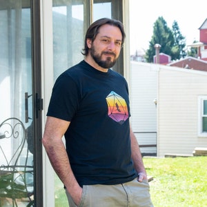 SoftStyle Unisex T-Shirt - D20 Dice with Dragon and Sunset design