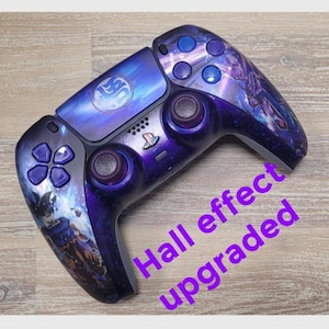 May include: A custom PlayStation 5 controller with a purple and blue design. The controller has a unique graphic design with a celestial theme and the text "Hall effect upgraded".