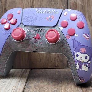 Wow Playstation/PS5 custom controller Kuromi with pink/rose thumb-sticks and white rings on