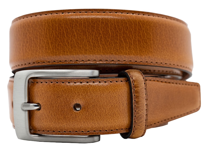 May include: A tan leather belt with a textured surface and visible stitching along the edges. The belt features a rectangular silver-toned metal buckle with a single prong and a matching leather keeper loop, coiled into a circular shape.