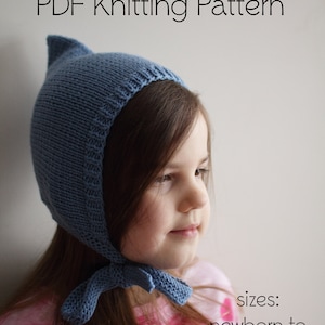 May include: A blue knitted baby bonnet with a tie. The bonnet is worn by a child with long brown hair. The text "PDF Knitting Pattern" and "sizes: newborn to 10 years" is visible in the image.