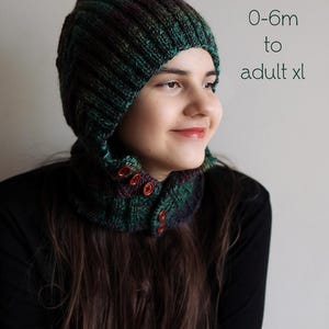 May include: PDF Knitting Pattern image. A knitted hat and cowl set in shades of green, purple, and black. The cowl has red buttons. Text on the image reads "PDF Knitting Pattern" and "sizes: 0-6m to adult xl".