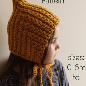 May include: A mustard yellow knitted baby bonnet with a pointed top and ties. The bonnet is made with a cable stitch pattern. The text "PDF Knitting Pattern" and "sizes: 0-6m to teen" is visible in the image.
