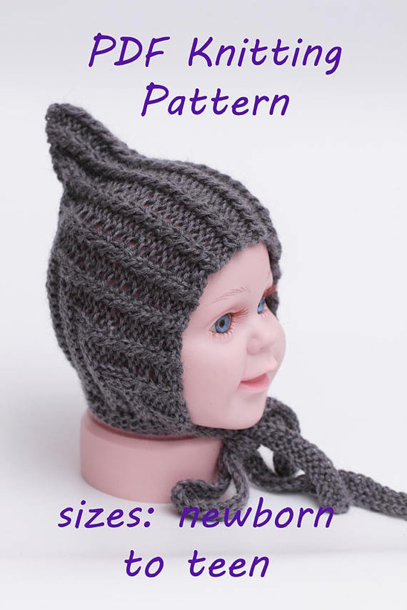 May include: A gray knitted baby hat with a pointed top and a long tie. The hat is on a mannequin head. The text "PDF Knitting Pattern" and "sizes: newborn to teen" is printed below the hat.