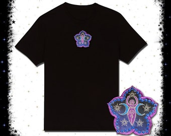 May include: Black t-shirt with a purple and blue embroidered flower design featuring a woman standing between two moons and stars. The design is also available as a separate patch.