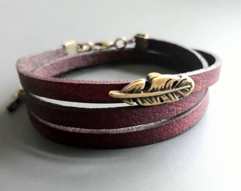 Leather wrap bracelet bronze plate feather