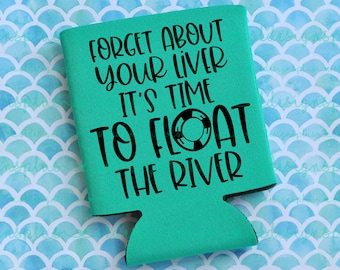 May include: A teal can cooler with black text that reads "FORGET ABOUT YOUR LIVER IT'S TIME TO FLOAT THE RIVER." The design includes a black and white life preserver graphic. The background is a blue and white scale pattern.