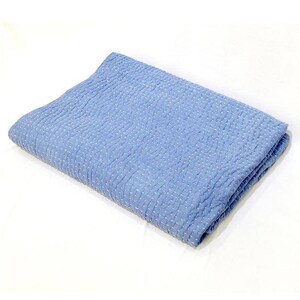 May include: A light blue kantha quilt with a white stitching pattern. The quilt is folded in half and is made of cotton.