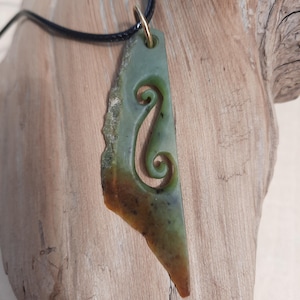 Nephrite jade natural freeform pendant.