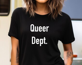 May include: Black t-shirt with the words "Queer Dept." printed in white. The shirt has short sleeves and a crew neck. The text is centered on the front of the shirt.