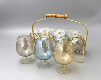 Cognac snifter crystal glasses in the design typical of the 1950s. Six hand-blown, cut glasses with brass holder.