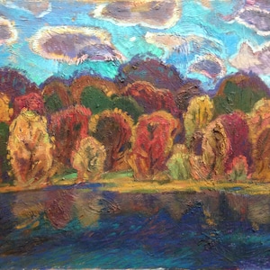 May include: A painting depicting a woodland scene with a lake in the foreground. The trees are painted in shades of red, orange, yellow, and green. The sky is blue with white clouds. The lake is a deep blue with reflections of the trees.