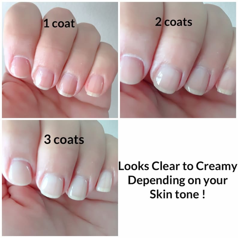 May include: Close-up of fingernails with three different coats of clear nail polish. The image shows one coat, two coats, and three coats of polish. The caption reads "Looks Clear to Creamy Depending on your Skin tone!"
