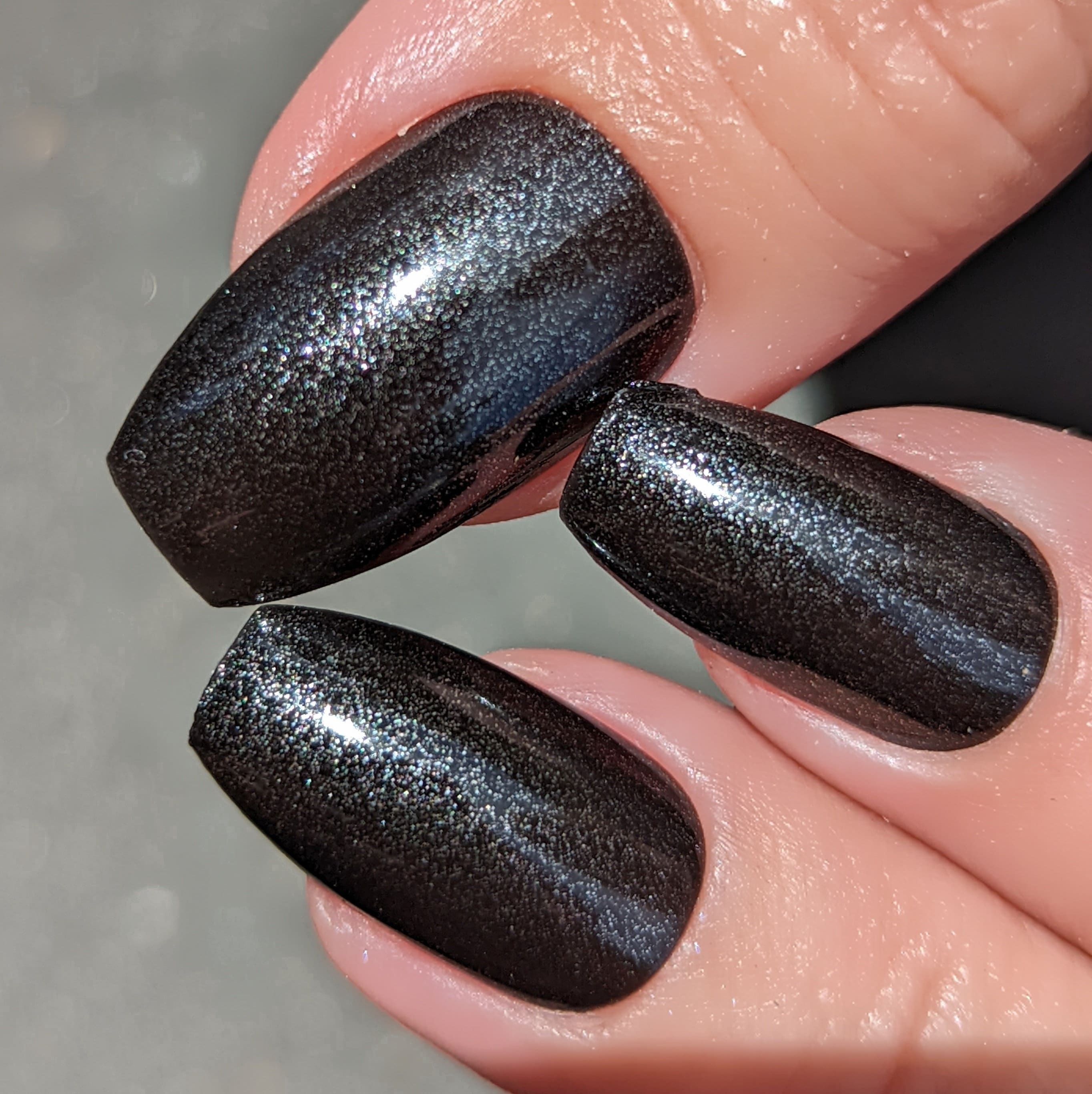Sleek Black Metallic Nails for Evening Out