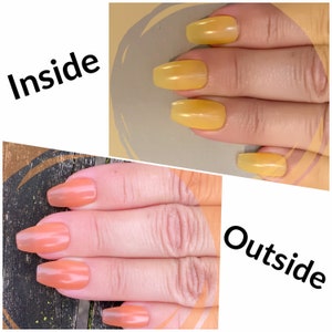 May include: Two hands with long, oval-shaped nails. The nails on the left hand are painted a light peach color, while the nails on the right hand are painted a light yellow color. The text "Inside" is on the left side of the image and the text "Outside" is on the right side of the image.