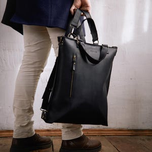 男性用ブラックレザーシティコンバーチブルバックパック | 13～16インチノートパソコン用本革トートバッグ | 女性用レザーバックパック 2in1