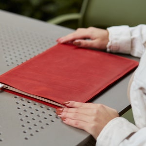 Red minimalistic leather laptop sleeve vertical