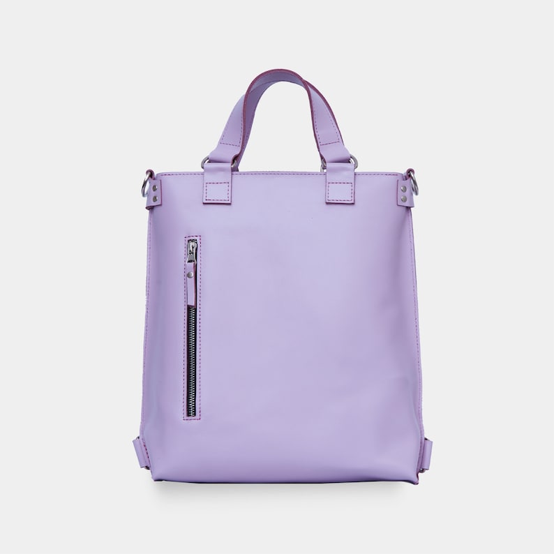 a purple handbag with straps