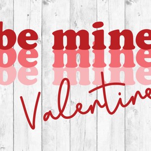May include: A Valentine's Day graphic with the text "be mine" in red and pink letters, with the word "Valentine" in red cursive script.