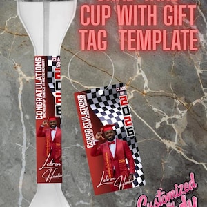 May include: Clear plastic yard cup with a black lid and straw. The cup has a personalized label and gift tag with a graduation theme. The label and tag feature a photo of a graduate in a red suit, the text "Congratulations", and the name "Lebron Hunter".