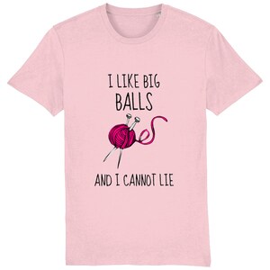 May include: Pink t-shirt featuring a humorous graphic of a ball of yarn and knitting needles. The text reads "I like big balls and I cannot lie."