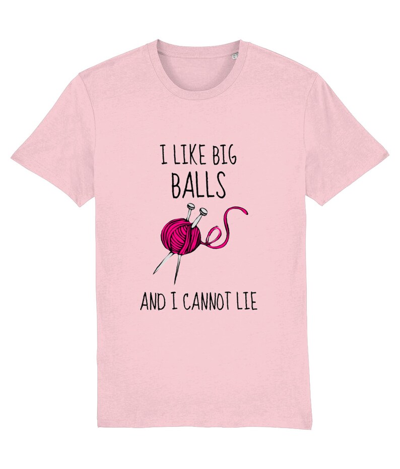 May include: Pink t-shirt featuring a humorous graphic of a ball of yarn and knitting needles. The text reads "I like big balls and I cannot lie."