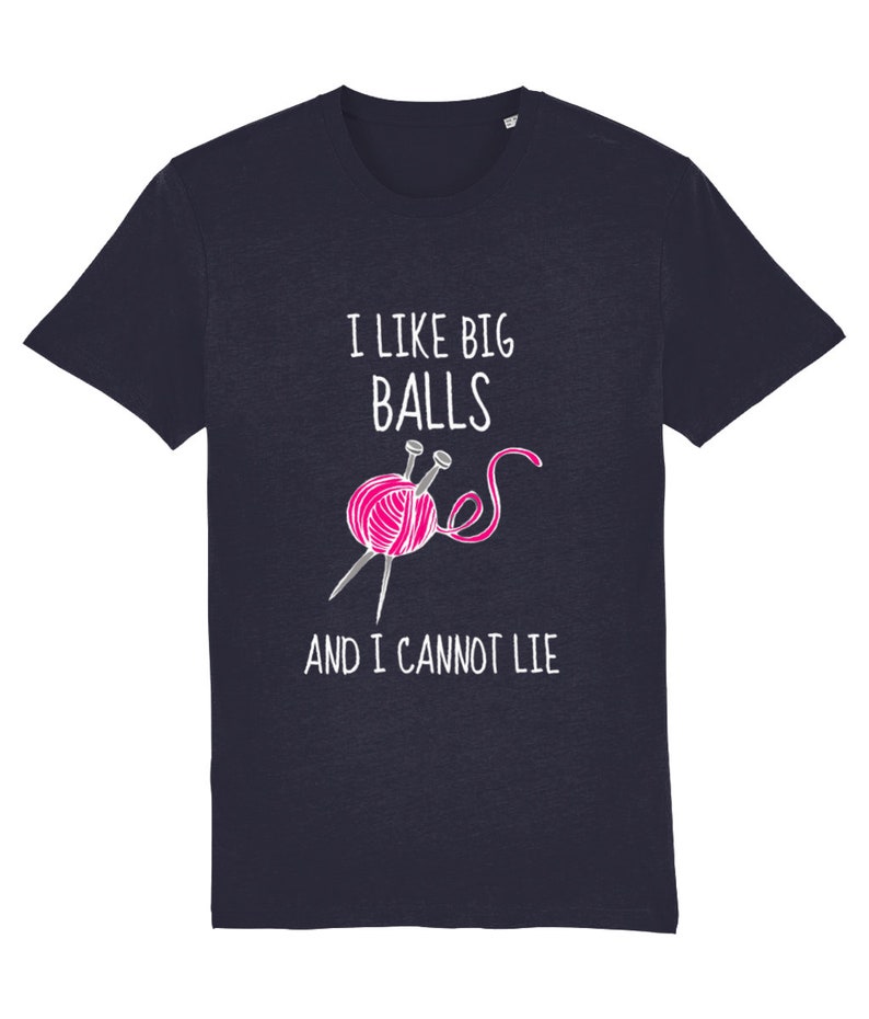 May include: Navy blue t-shirt with a white graphic of a pink ball of yarn and knitting needles. The text "I like big balls and I cannot lie" is printed on the shirt.
