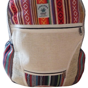 May include: A beige hemp backpack with a colourful striped pattern on the top flap. The flap has a label that reads "Himalayan Hemp TWC Free Made in Nepal".