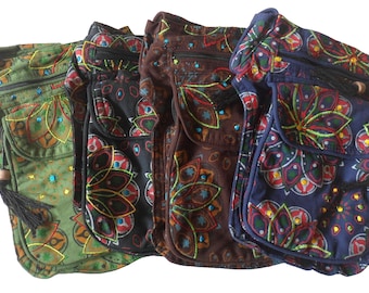May include: Three colorful fabric bags with intricate floral patterns and beaded accents. The bags have a zippered pocket and a flap closure.
