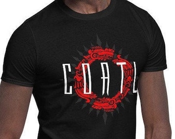 May include: A black t-shirt with a red and white graphic design. The graphic features a circle with the word "COATL" in white letters and a red design inside the circle.
