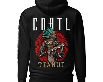 May include: Black zippered hoodie with a graphic of a jaguar warrior wearing a headdress and holding a weapon. The graphic is surrounded by a red and white circular design. The text "COATL TIAHUI" is printed on the hoodie.