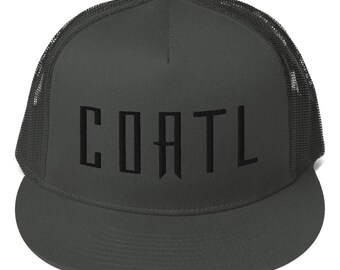 May include: A dark gray trucker hat with a black mesh back. The hat has the word "COATL" embroidered on the front in black.