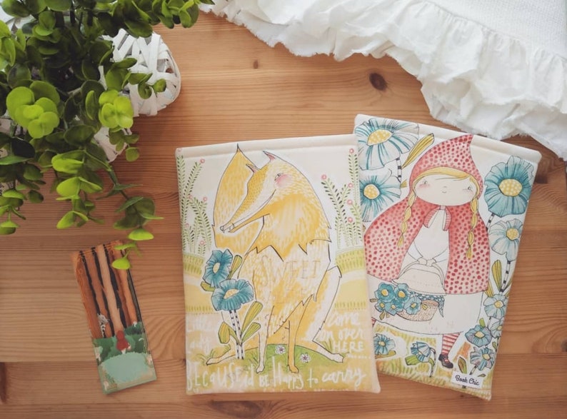 May include: Two book covers with illustrated designs. The first cover features a yellow fox with the text "Sweet" and "Because it has to carry". The second cover features a girl in a red hooded cloak with a basket of flowers and the text "Come on here".