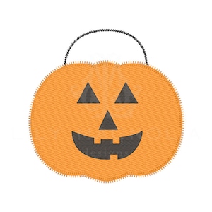 May include: Orange pumpkin-shaped Halloween treat bag with a black smiling jack-o'-lantern face.