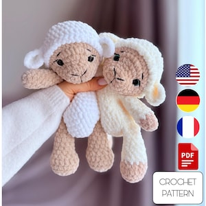 May include: Two handmade crochet sheep toys. The sheep have white fluffy bodies, beige faces and legs, and white caps. The toys are held in a person's hand. The image also includes a "CROCHET PATTERN" graphic.