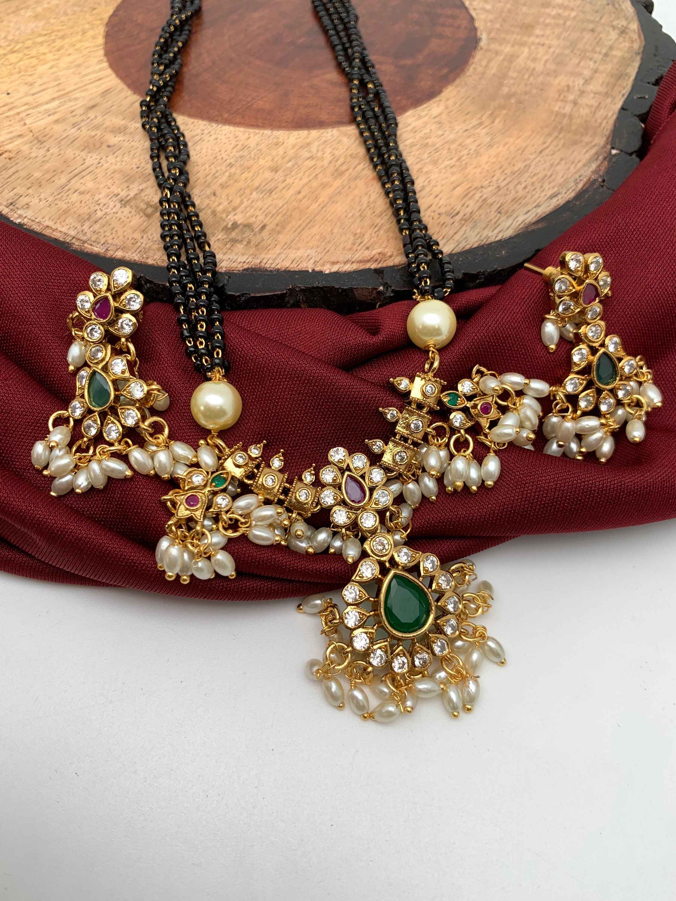 Gutta pusalu black sale beads