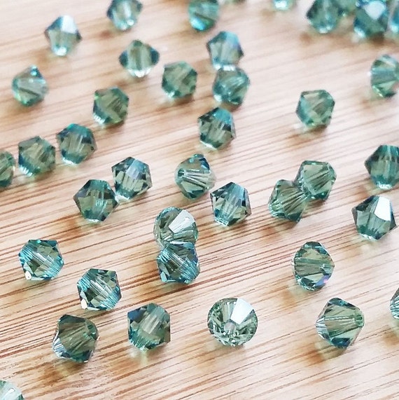 **25 toupies 3 mm SWAROVSKI SAPPHIRE AB ** 5328