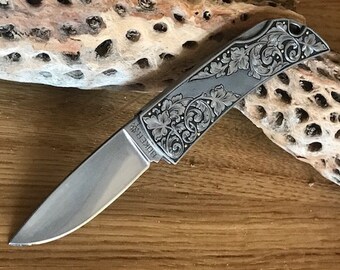 Unique, hand engraved, stainless steel, Böker gentleman's pocket knife, by master engraver Marcus Hunt. Great gift!