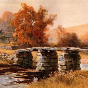 May include: Watercolour painting depicting a stone bridge over a stream in a rural setting. The image shows a cottage, trees with autumnal orange leaves, and a field of golden grass, creating an autumn atmosphere.