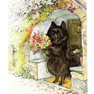 May include: A black dog holding a bunch of colourful flowers stands in a stone doorway with a green door. The dog is smiling and has its tongue sticking out. The doorway is covered in green vines with purple flowers.