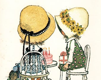 May include: A vintage illustration depicts two children at a birthday party. One wears a straw hat with a black ribbon, the other a white bonnet with yellow flowers. A cake with candles and gifts are on the table. Text reads: "Enjoy your friends..."
