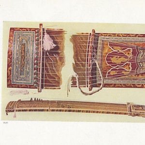 May include: A traditional Japanese musical instrument called a Koto. The Koto is a long, wooden zither with 13 strings. The instrument is decorated with intricate carvings and designs. The Koto is a popular instrument in Japanese music and is often used in traditional ceremonies and performances.