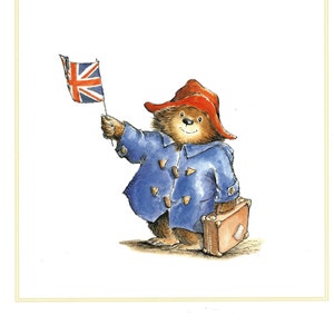 May include: A cartoon bear wearing a red hat and blue coat holds a small Union Jack flag and a brown suitcase.
